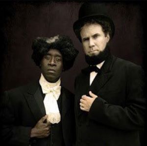 Picture with Don Cheadle dressed as a women on the left and Will Farrel dressed up as Lincoln on the right