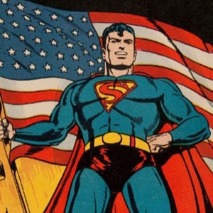 Picture of supermen in blue costume holding an American flag in his right hand