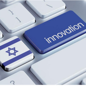 A computer keyboard features two tabs located next to each other, one with a flag of the State of Israel and a second with the word “innovation.”